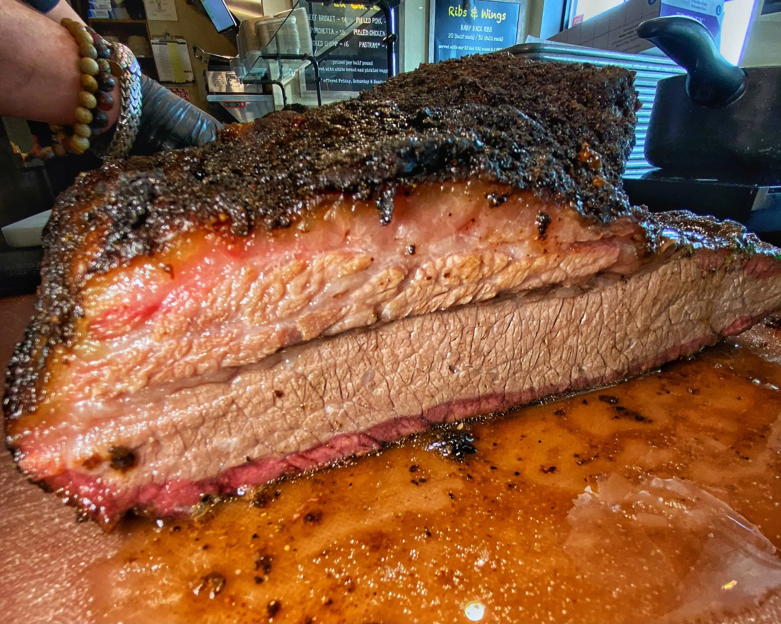 A close up of a piece of meat on top of a table.