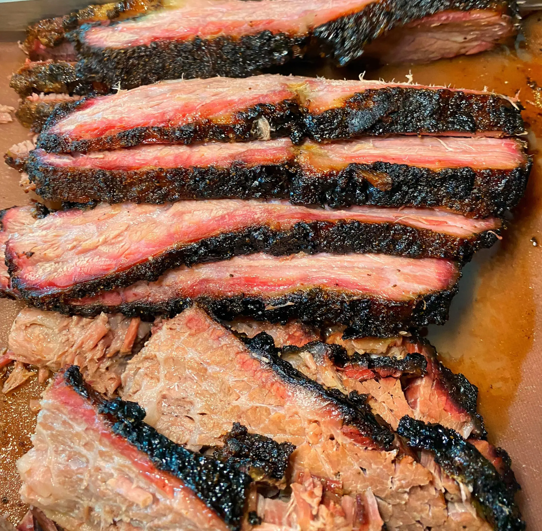 A close up of some meat on top of a pan