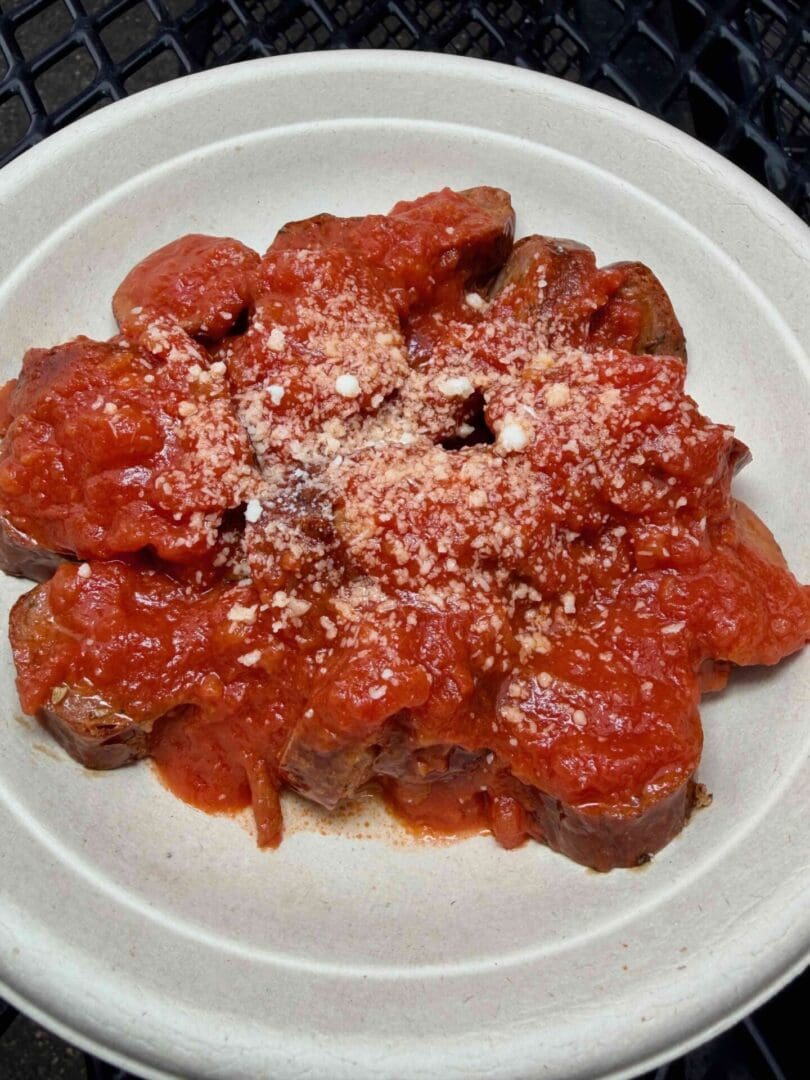 Craft pork and beef sausage, smoked and topped with tomato sauce and Pecorino Romano cheese